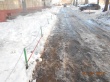 На территории Заводского района осуществляются работы по обработке тротуаров пескосоляной смесью