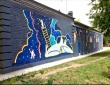 В Кировском районе появилось граффити «Космос среди нас»