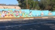 Художники раскрасили городские стены